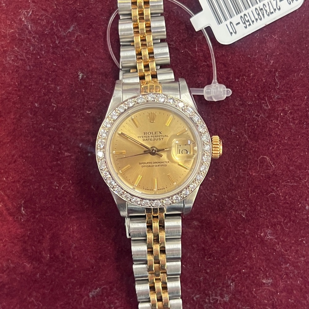 Rolex Women's Gold Dial Watch with Silver and Gold Bracelet